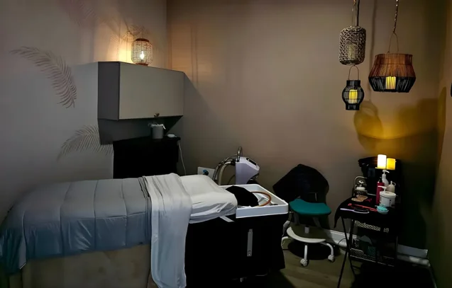 Luxury treatment room at Hairplay Spa in Oklahoma City with ambient lighting and serene decor